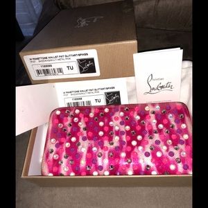 Authentic Christian Louboutin zippy wallet